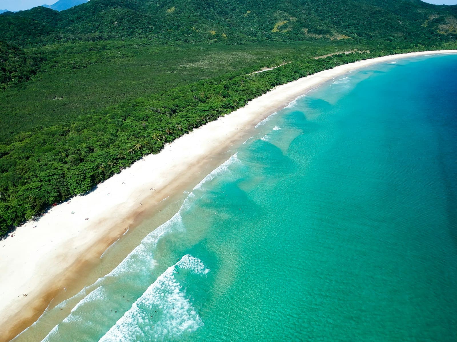 Aerial view of the white sand and turquoise sea of Lopes Mendes, Ilha Grande