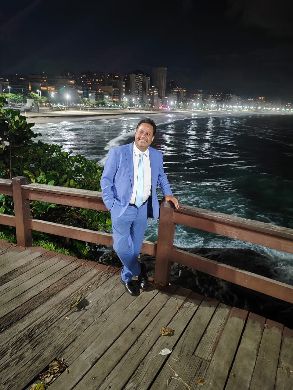 Your private MomoRio guide on the Leblon boardwalk in Rio de Janeiro at night